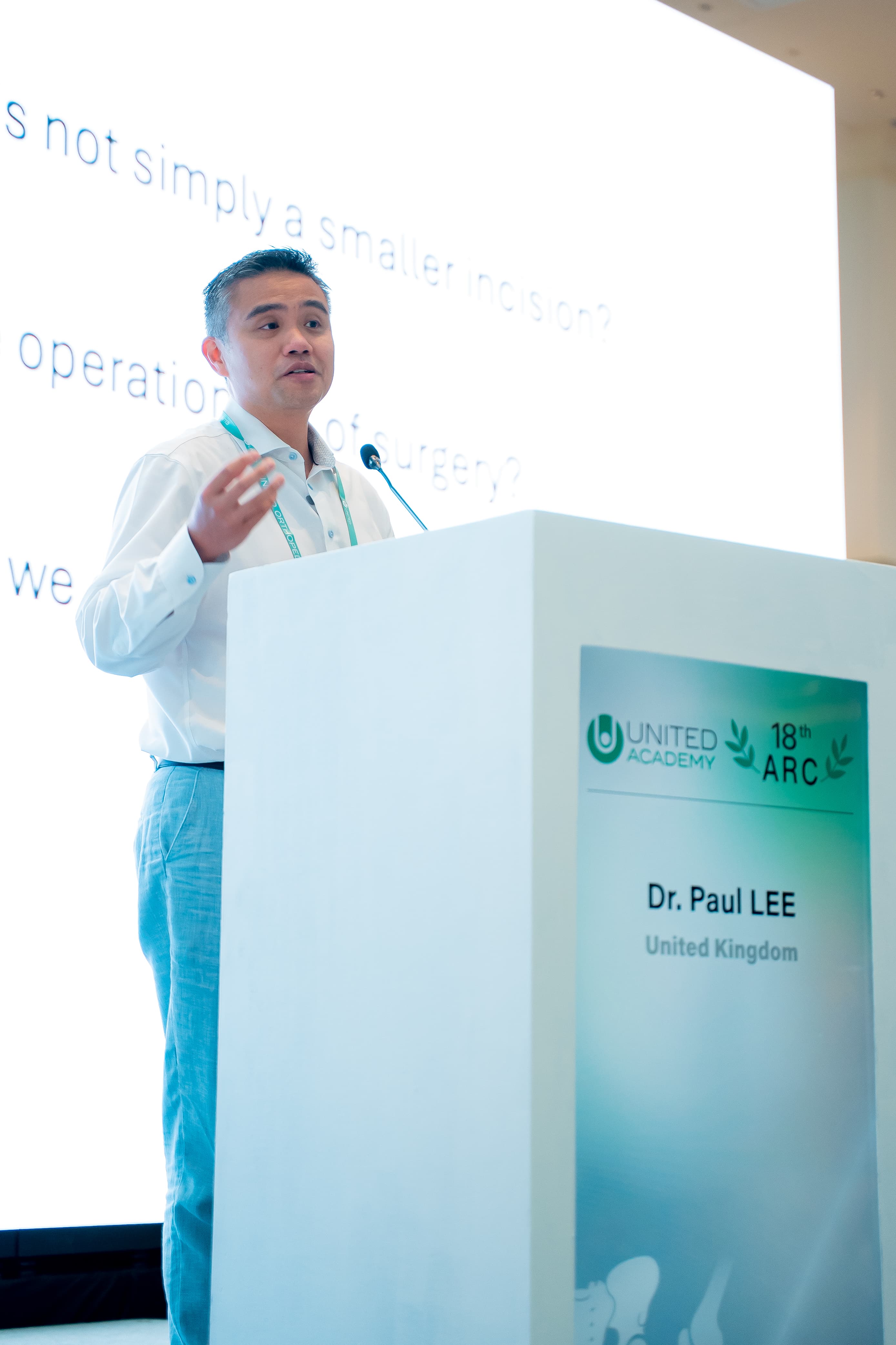 Professor Paul Lee presenting Surgery Through a Needle at the ARC podium