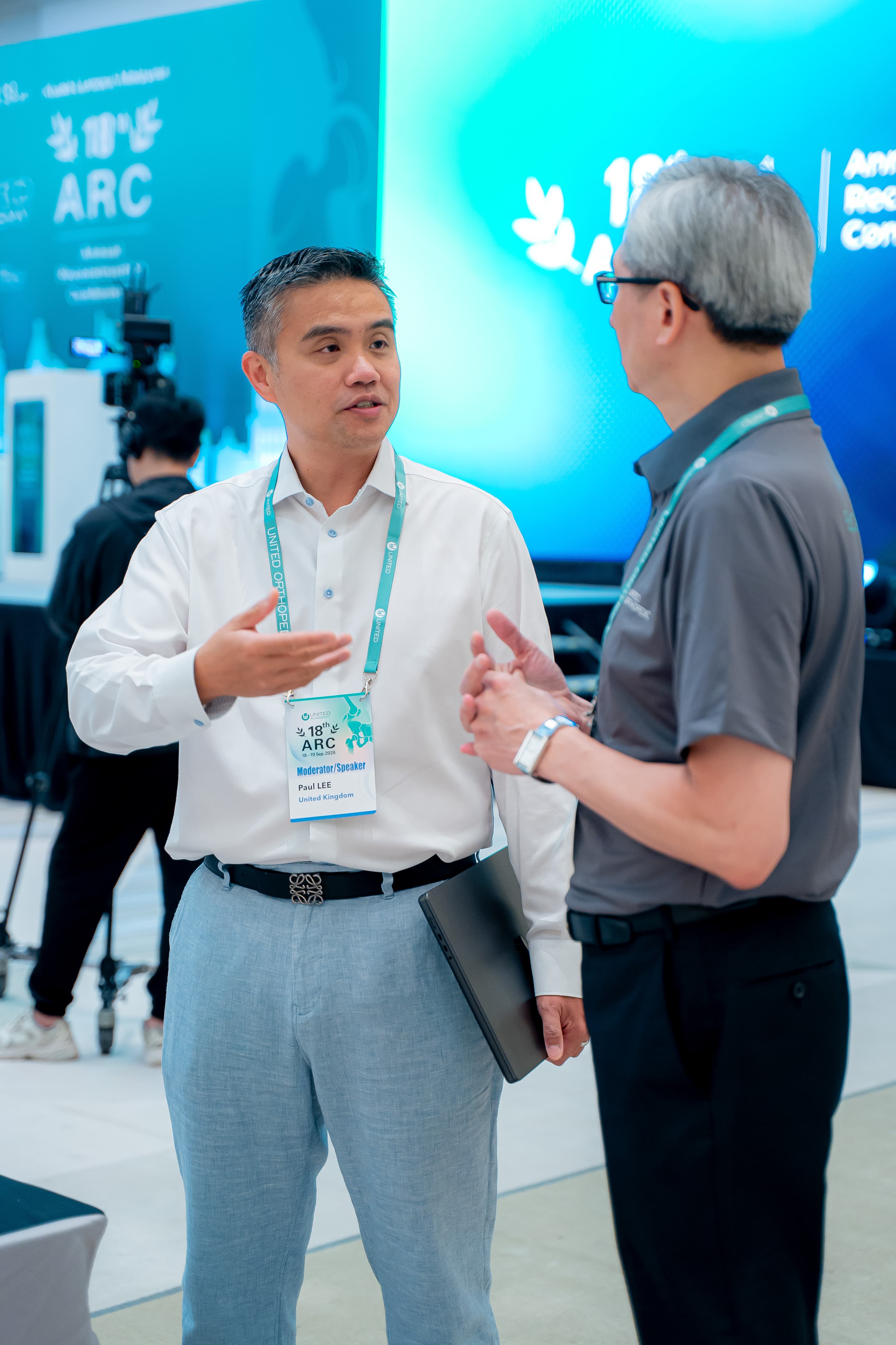 Professor Paul Lee, Moderator and Speaker, in conversation with a delegate at ARC 2026